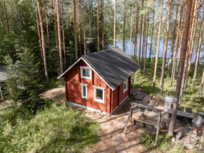 Traditional cottage with hot tub Uurainen